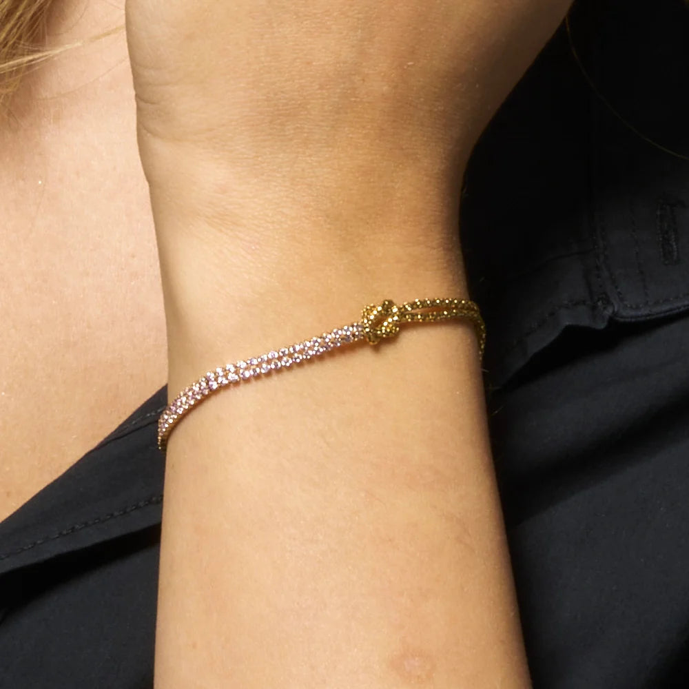 Bracciale donna in acciaio IP Gold con nodo e zirconi rosa - Luca Barra