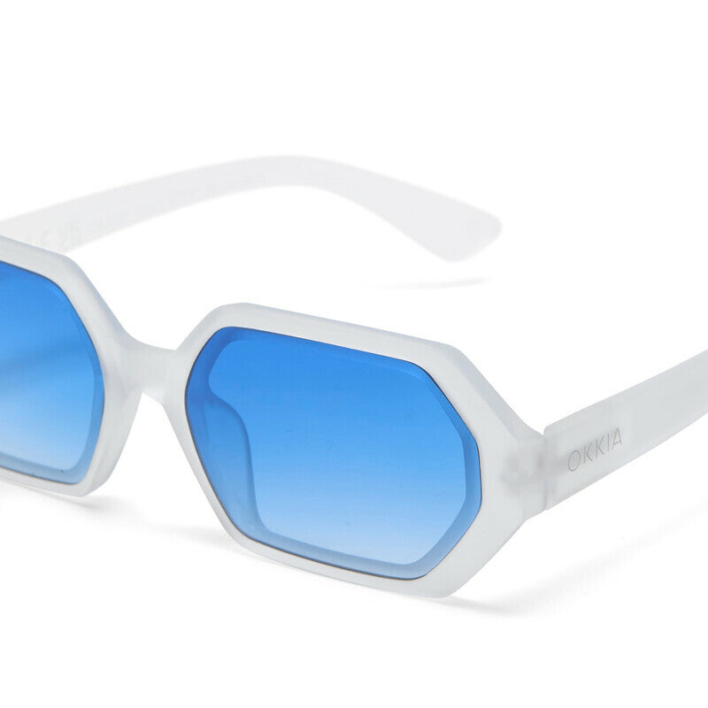 Occhiali da sole esagonali modello Andrea trasparenti con lenti blu - Più Forty